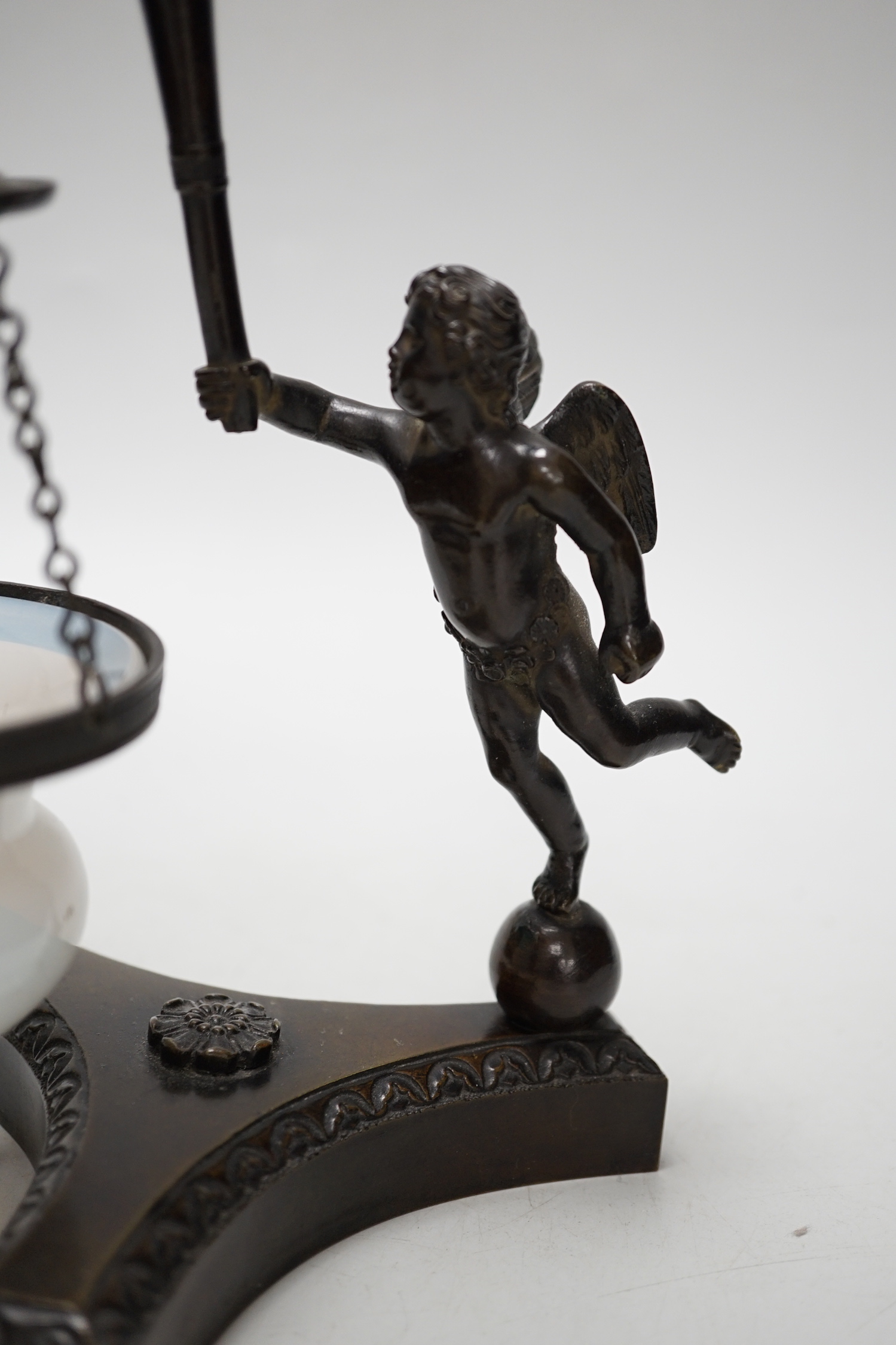 An early 19th century bronze ‘angel’ perfume warmer, 20cm high